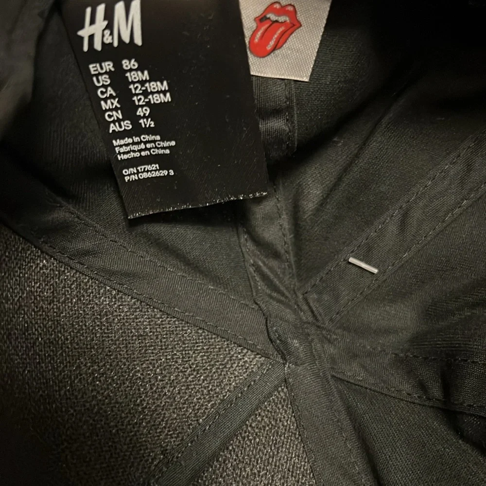NWT Gender Neutral H and M Rolling Stones Flat Rim Hat!